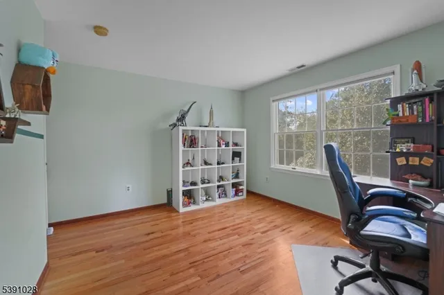 a workspace with a bookshelf