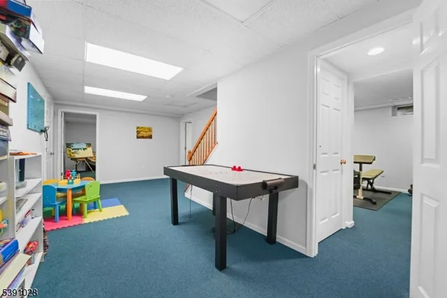 a room with furniture and a wooden floor