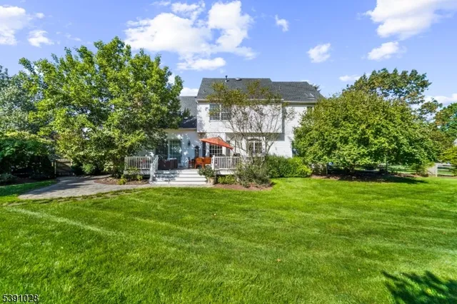 a view of a building with a yard