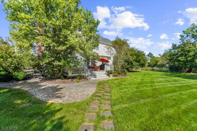 a view of a garden with a building