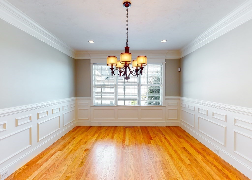 80 Clubhouse Way, Unit 80 Sutton, MA 01590 - Photo 4 of 29 a room with window wooden floor and outdoor space
