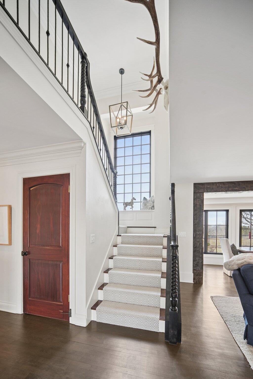 13700 Riverland Road Mequon, WI 53097 - Photo 30 of 63 Stairs to Upper Level