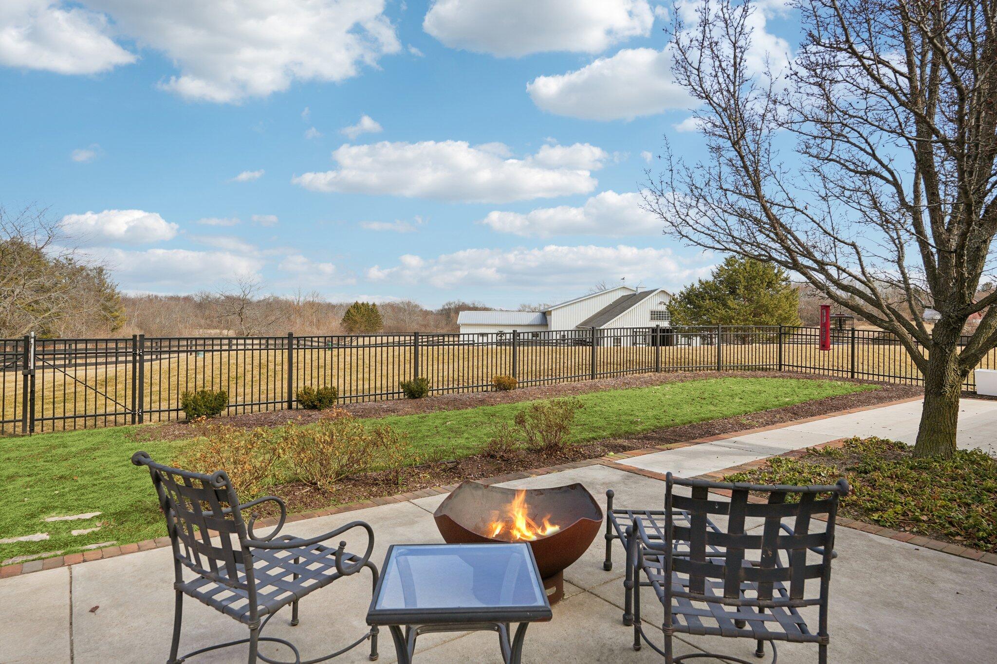 13700 Riverland Road Mequon, WI 53097 - Photo 48 of 63 Patio and Fenced Yard