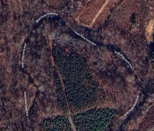 a bathroom with a mirror and a shower