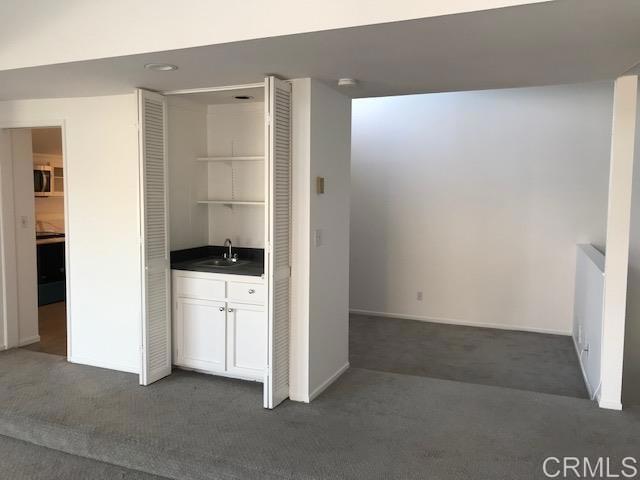 527 South Sierra Avenue, Unit 185 Solana Beach, CA 92075 - Photo 12 of 30 a view of walk in closet with cabinet