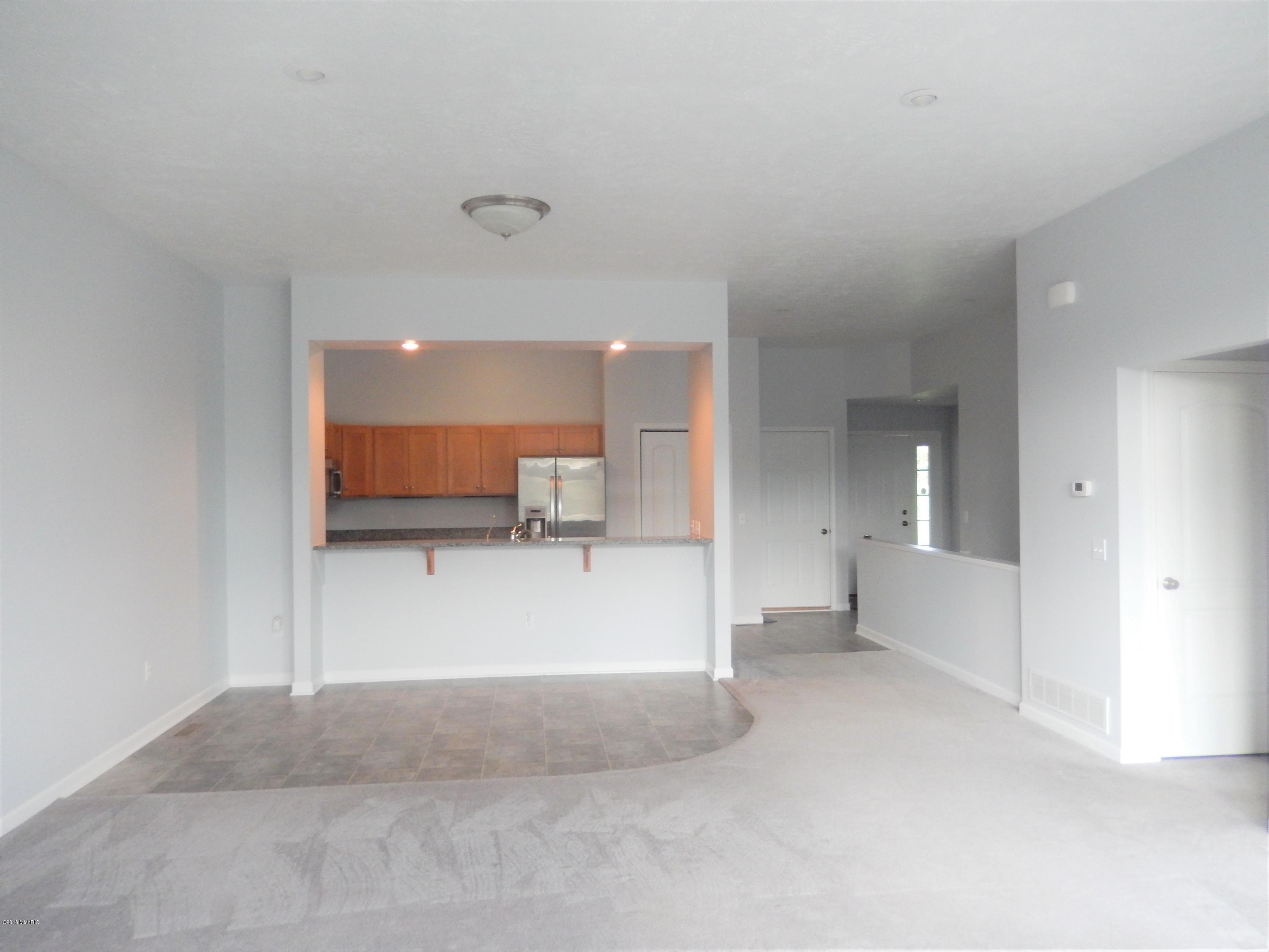 14100 Rivers Way, Unit 8 Big Rapids, MI 49307 - Photo 3 of 17 open kitchen