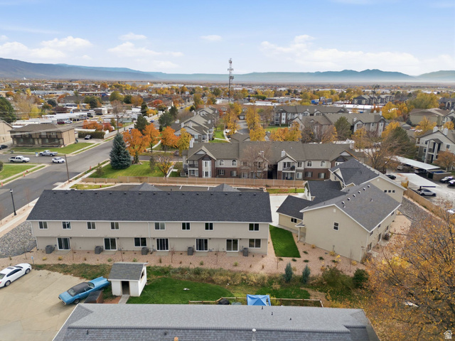 1615 North Angel Street, Unit H Layton, UT 84041 - Photo 45 of 55 Aerial view of residential area with a mountainous background