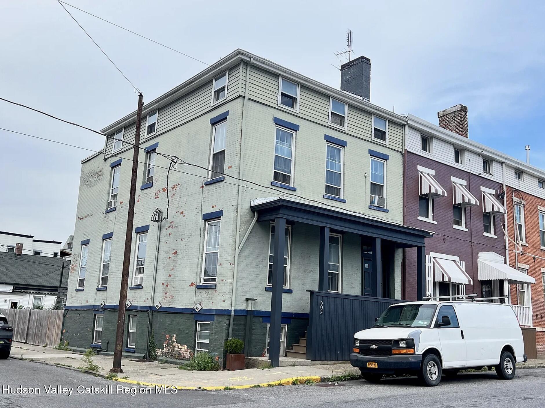 602 Columbia Street, Unit 1 Hudson, NY 12534 - Photo 2 of 19 a car parked in front of a building