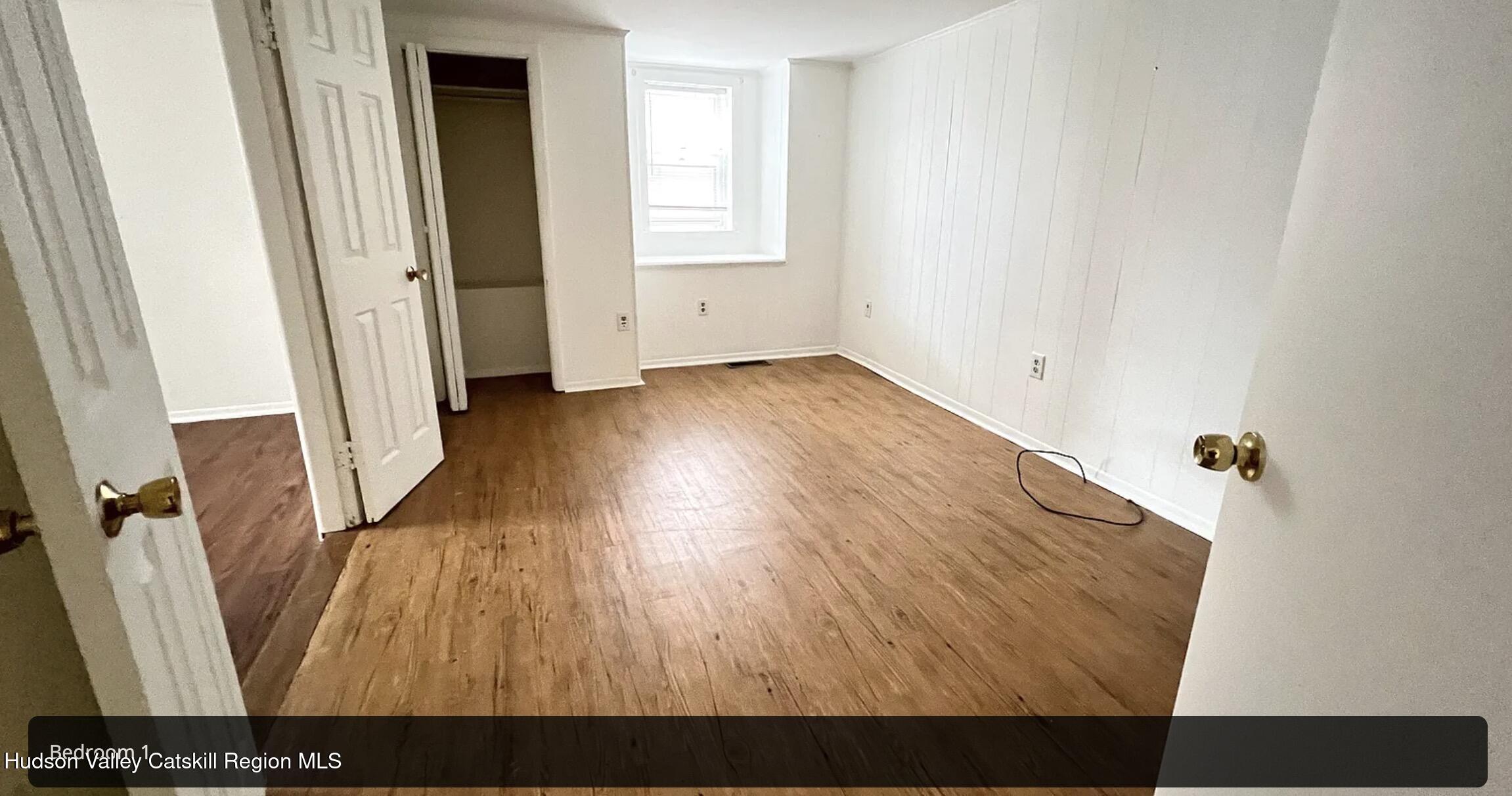 602 Columbia Street, Unit 1 Hudson, NY 12534 - Photo 7 of 19 a view of a room with wooden floor