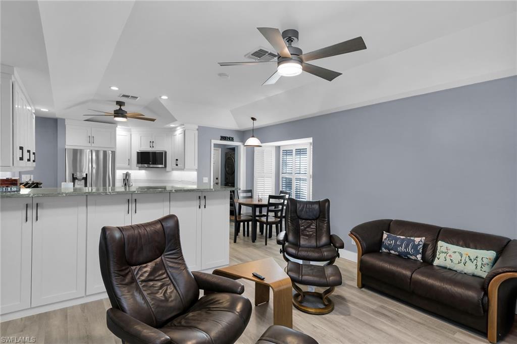 789 Coldstream Court Naples, FL 34104 - Photo 11 of 26 a living room with furniture