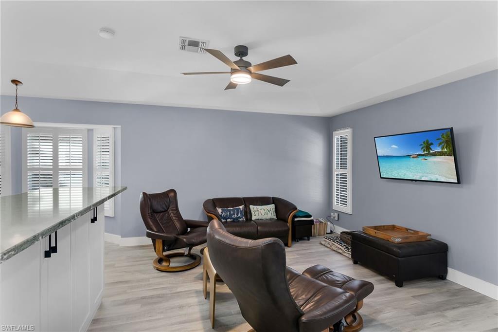 789 Coldstream Court Naples, FL 34104 - Photo 12 of 26 a living room with furniture