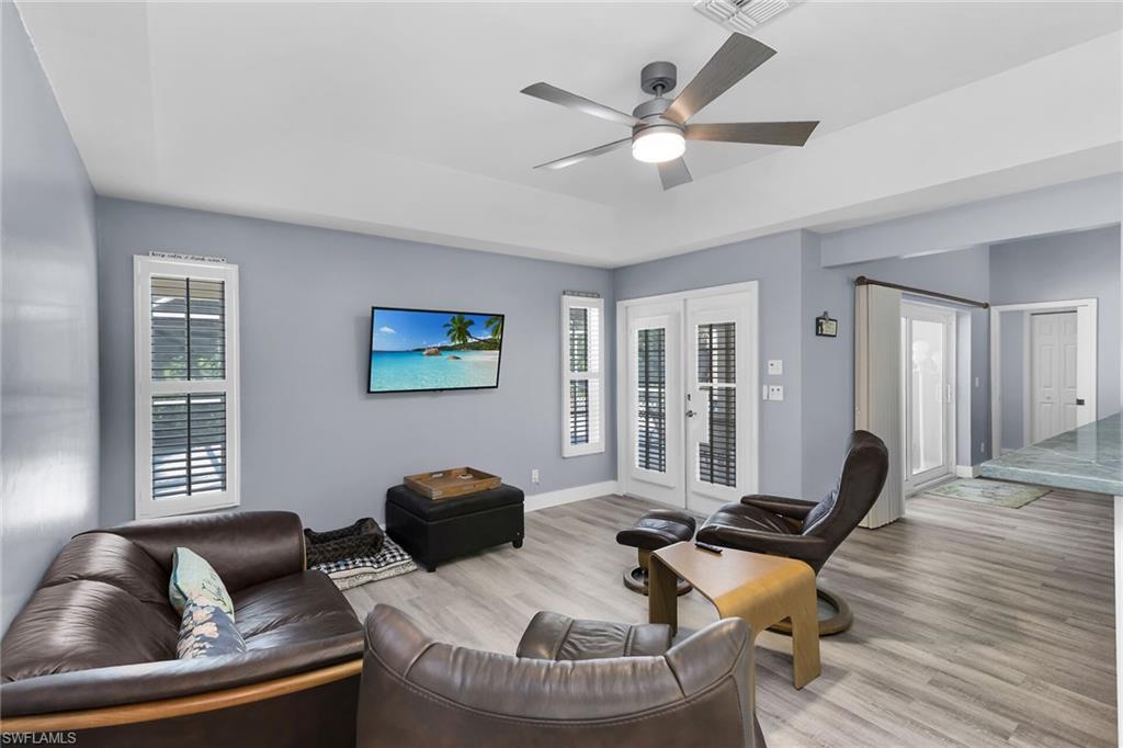 789 Coldstream Court Naples, FL 34104 - Photo 13 of 26 a workspace with furniture and a window