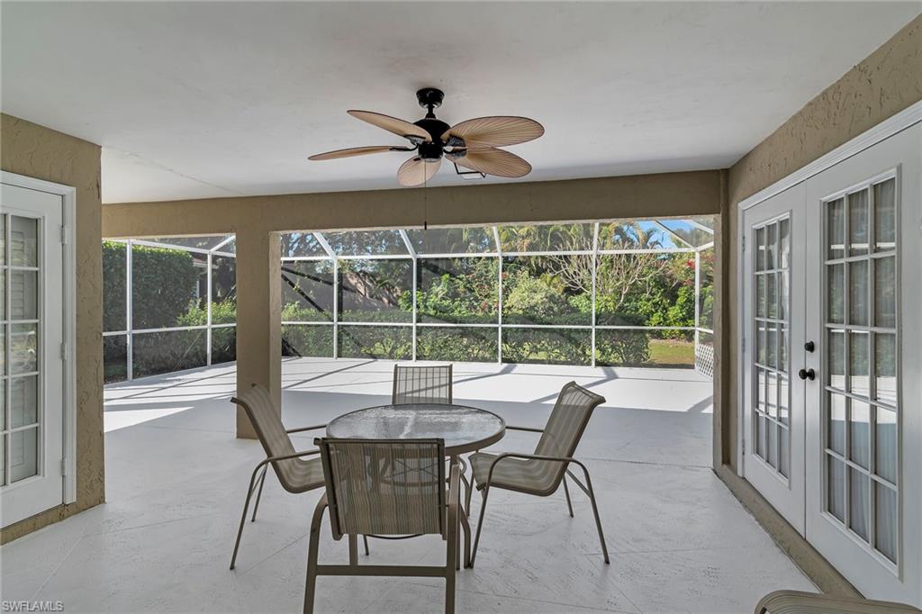 789 Coldstream Court Naples, FL 34104 - Photo 21 of 26 a view of a dining room with furniture window and outside view