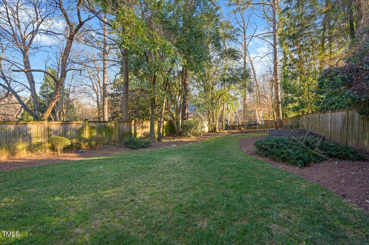 2412 Beechridge Road Raleigh, NC 27608 - Photo 29 of 39 a view of yard with green space