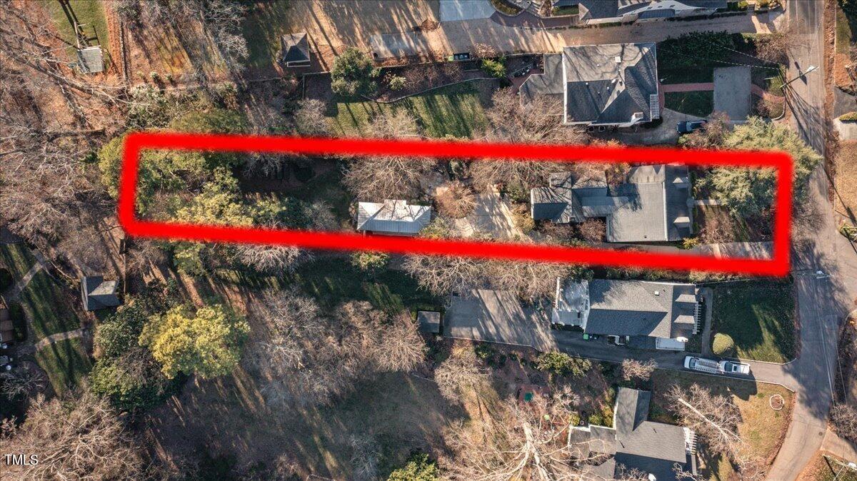 2412 Beechridge Road Raleigh, NC 27608 - Photo 32 of 39 a view of street with lots of trees and flowers