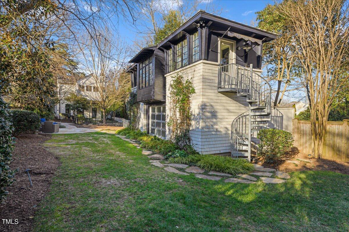 2412 Beechridge Road Raleigh, NC 27608 - Photo 33 of 39 a front view of a house with garden