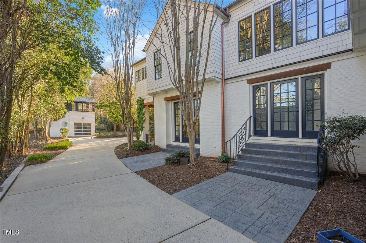 2412 Beechridge Road Raleigh, NC 27608 - Photo 39 of 39 a view of a building with many windows