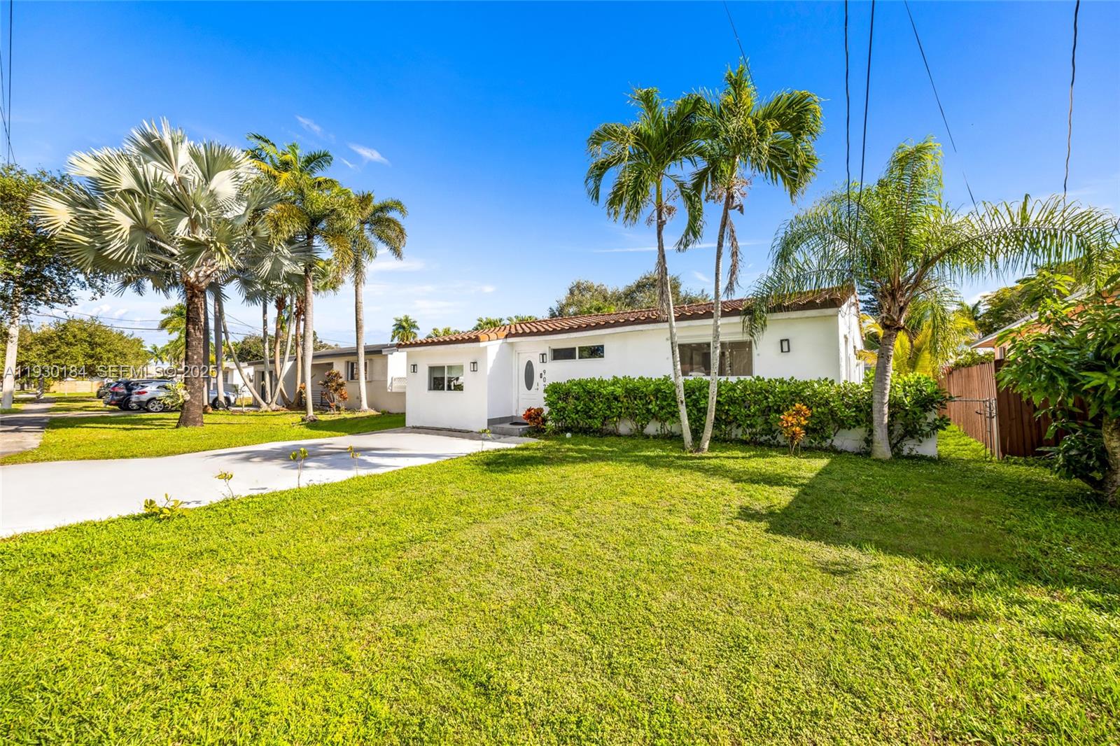 a view of a swimming pool and a yard