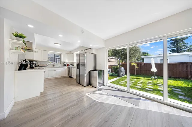 a view of kitchen with furniture and outdoor view