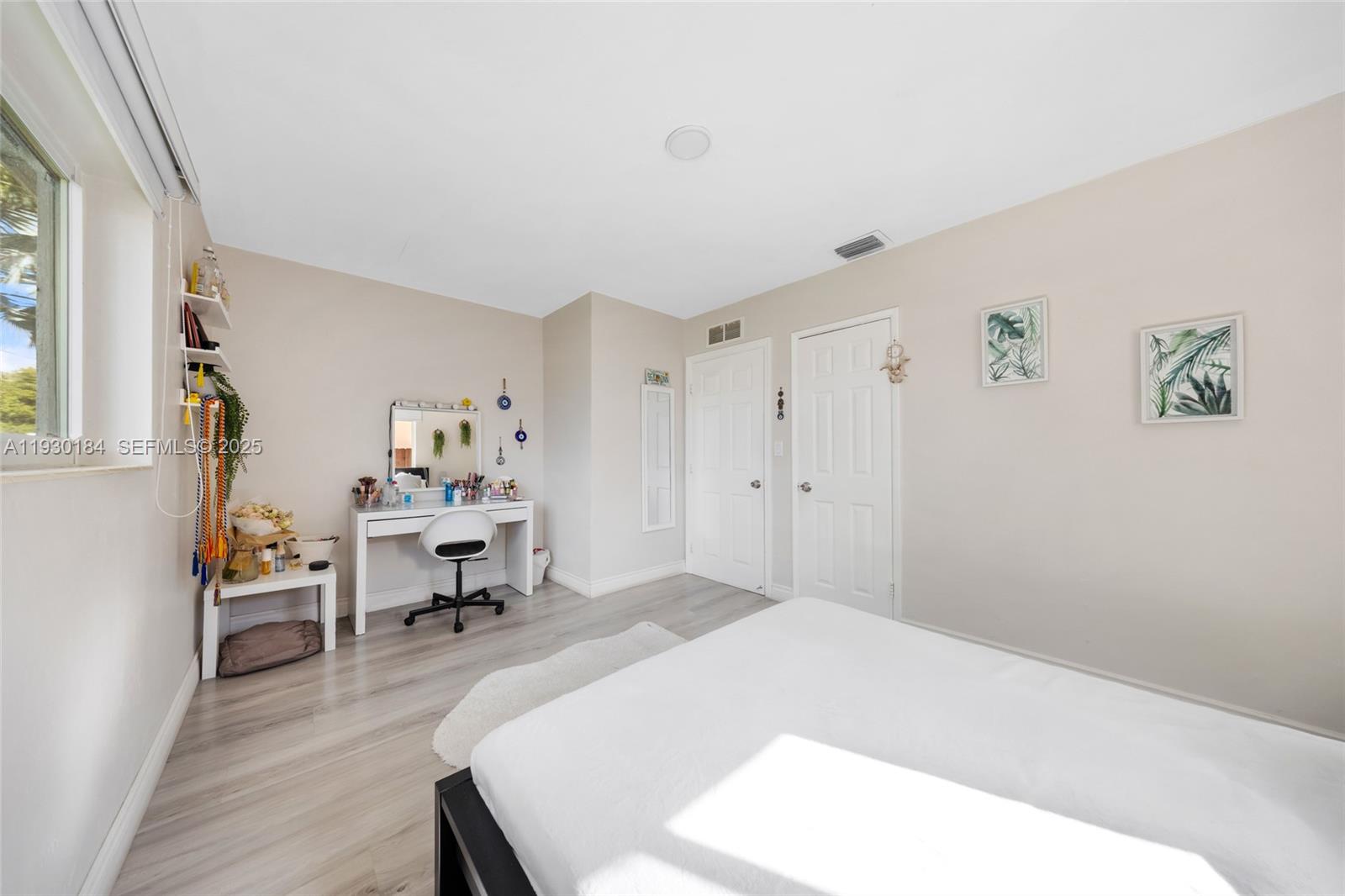 907 North Park Road Hollywood, FL 33021 - Photo 20 of 34 a bedroom with a bed and a chair in it