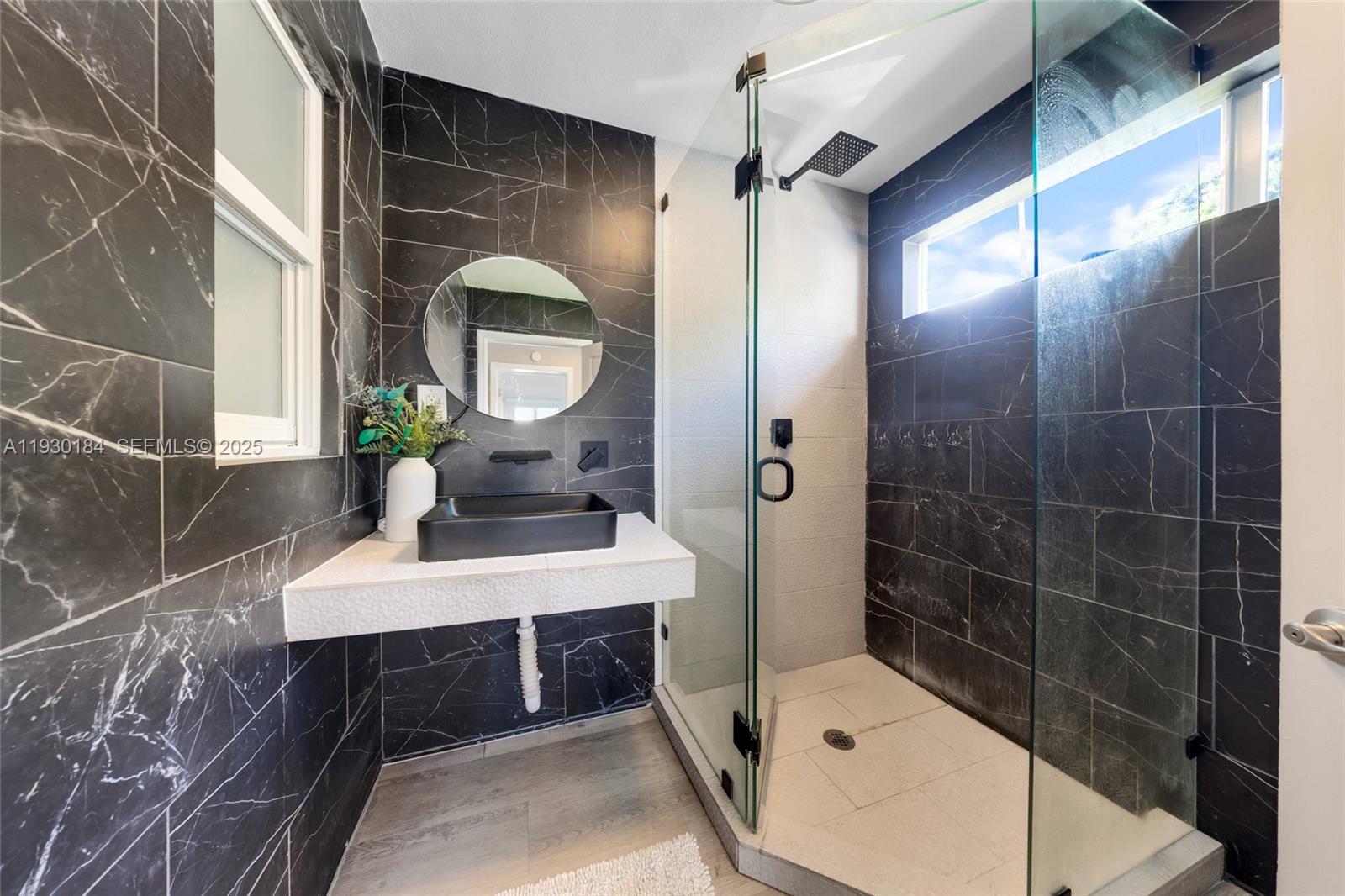 907 North Park Road Hollywood, FL 33021 - Photo 25 of 34 a bathroom with a sink toilet and shower