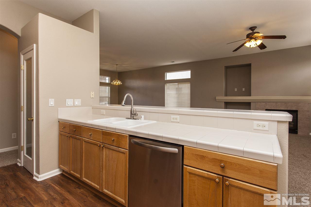 10430 Arbor Way Reno, NV 89521 - Photo 11 of 25 a bathroom with a sink and a mirror