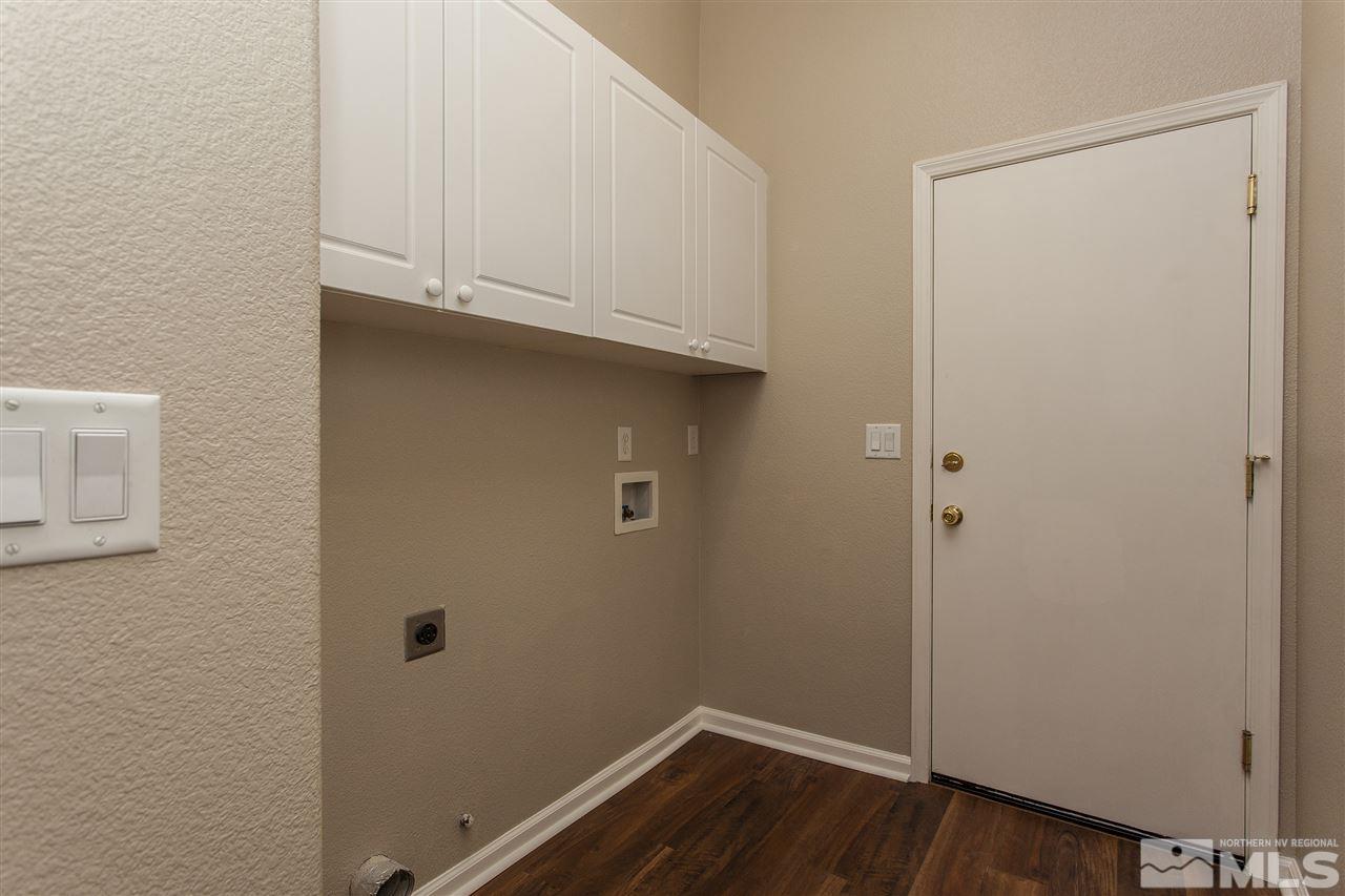 10430 Arbor Way Reno, NV 89521 - Photo 14 of 25 a view of cabinets and wooden floor