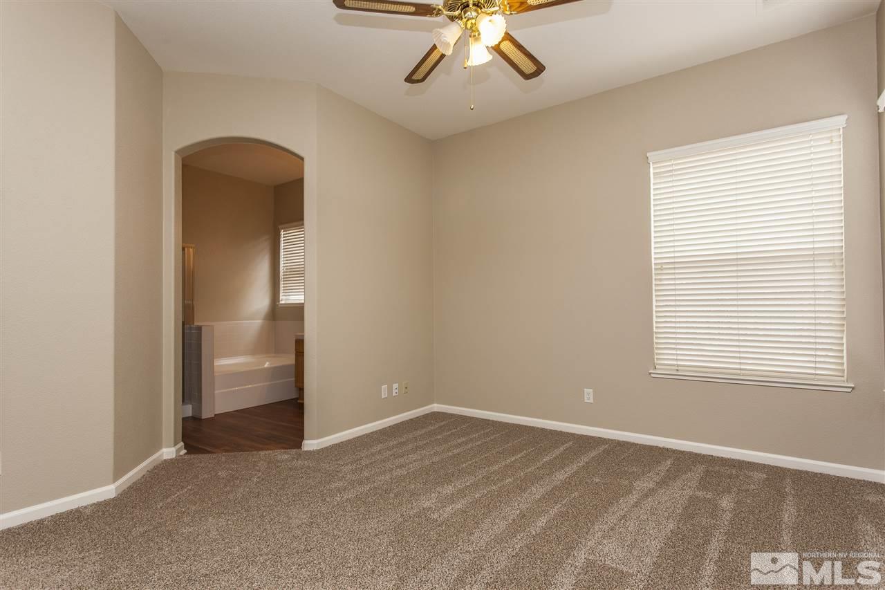 10430 Arbor Way Reno, NV 89521 - Photo 20 of 25 a view of an empty room with a window