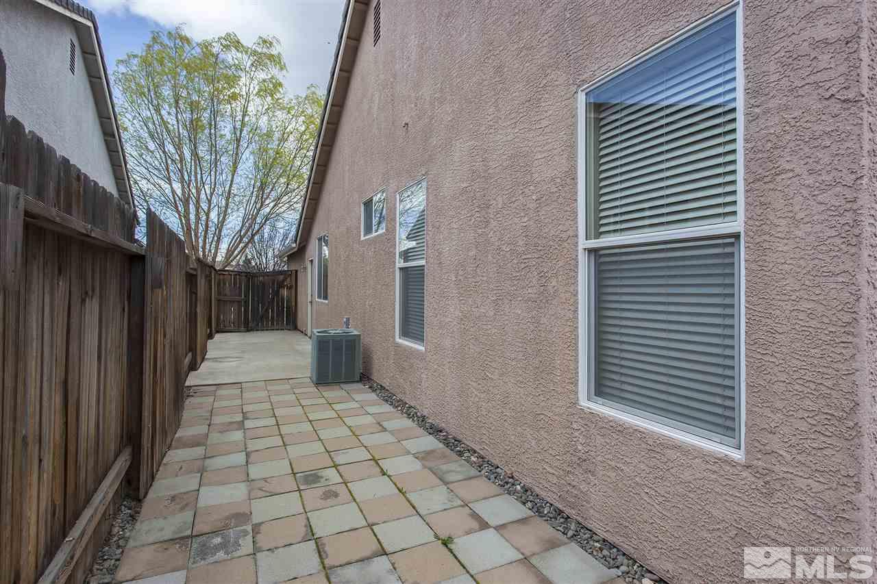 10430 Arbor Way Reno, NV 89521 - Photo 23 of 25 a view of a house with a trees