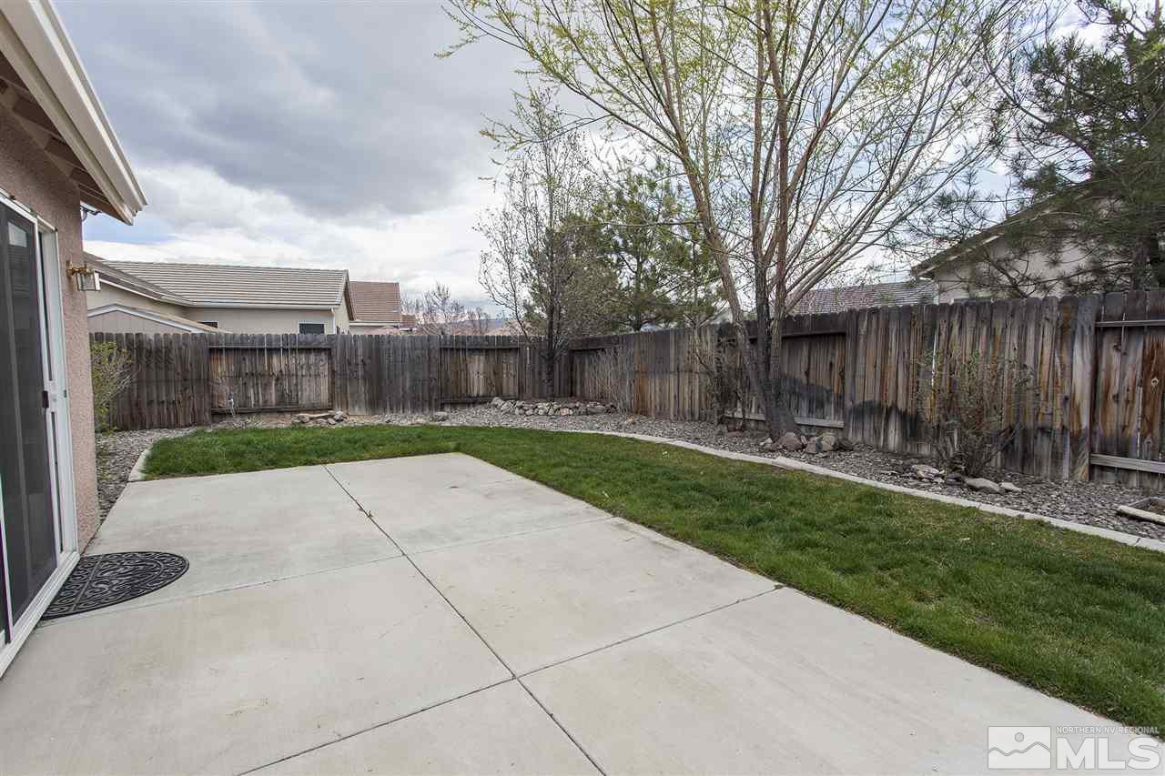 10430 Arbor Way Reno, NV 89521 - Photo 25 of 25 a view of a backyard with green space