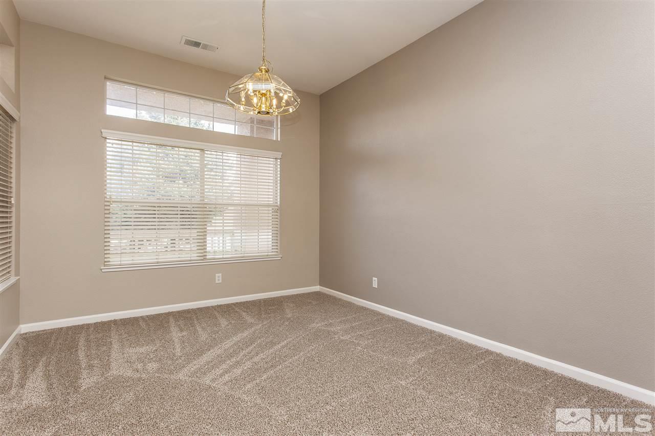 10430 Arbor Way Reno, NV 89521 - Photo 5 of 25 a view of an empty room with a window