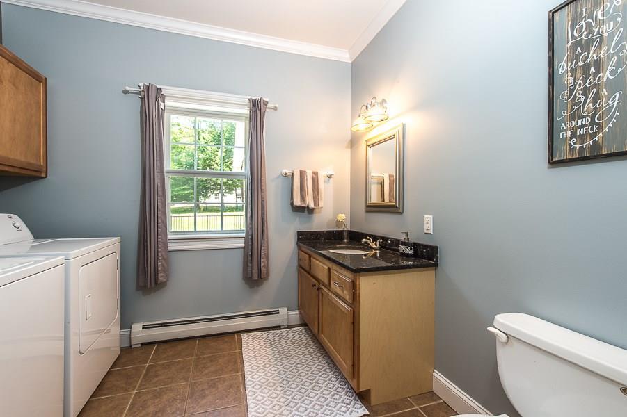 16 Collinsbrook Road Brunswick, ME 04011 - Photo 13 of 33 First floor bathroom and laundry