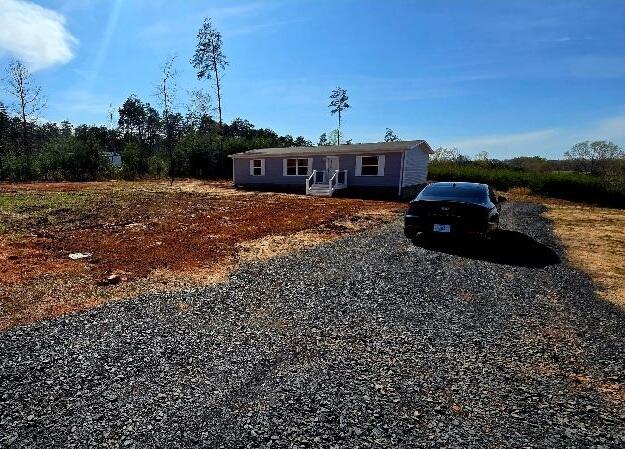 5450 Axton Road Axton, VA 24054 - Photo 19 of 20 a car parked in front of a house