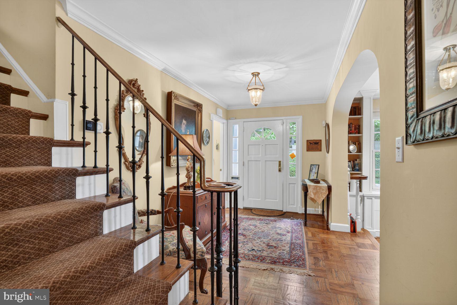 2260 48th Street Northwest Washington, DC 20007 - Photo 10 of 45 Stairway from foyer to main living area