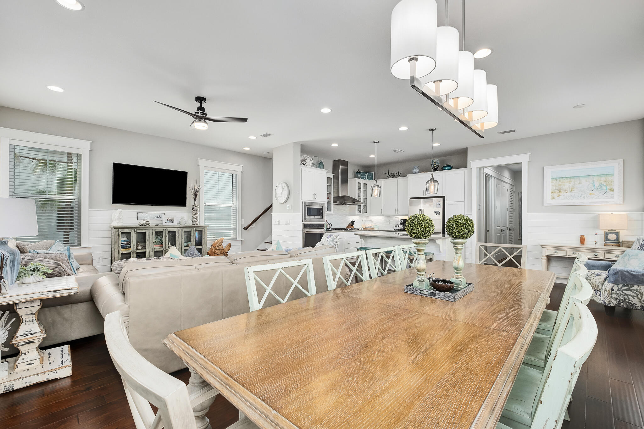442 Flatwoods Forest Loop Santa Rosa Beach, FL 32459 - Photo 11 of 46 a large kitchen with a table and chairs