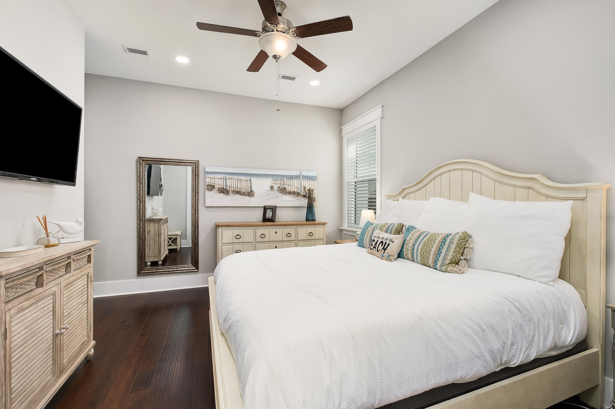 442 Flatwoods Forest Loop Santa Rosa Beach, FL 32459 - Photo 13 of 46 a bedroom with a large bed and a flat screen tv