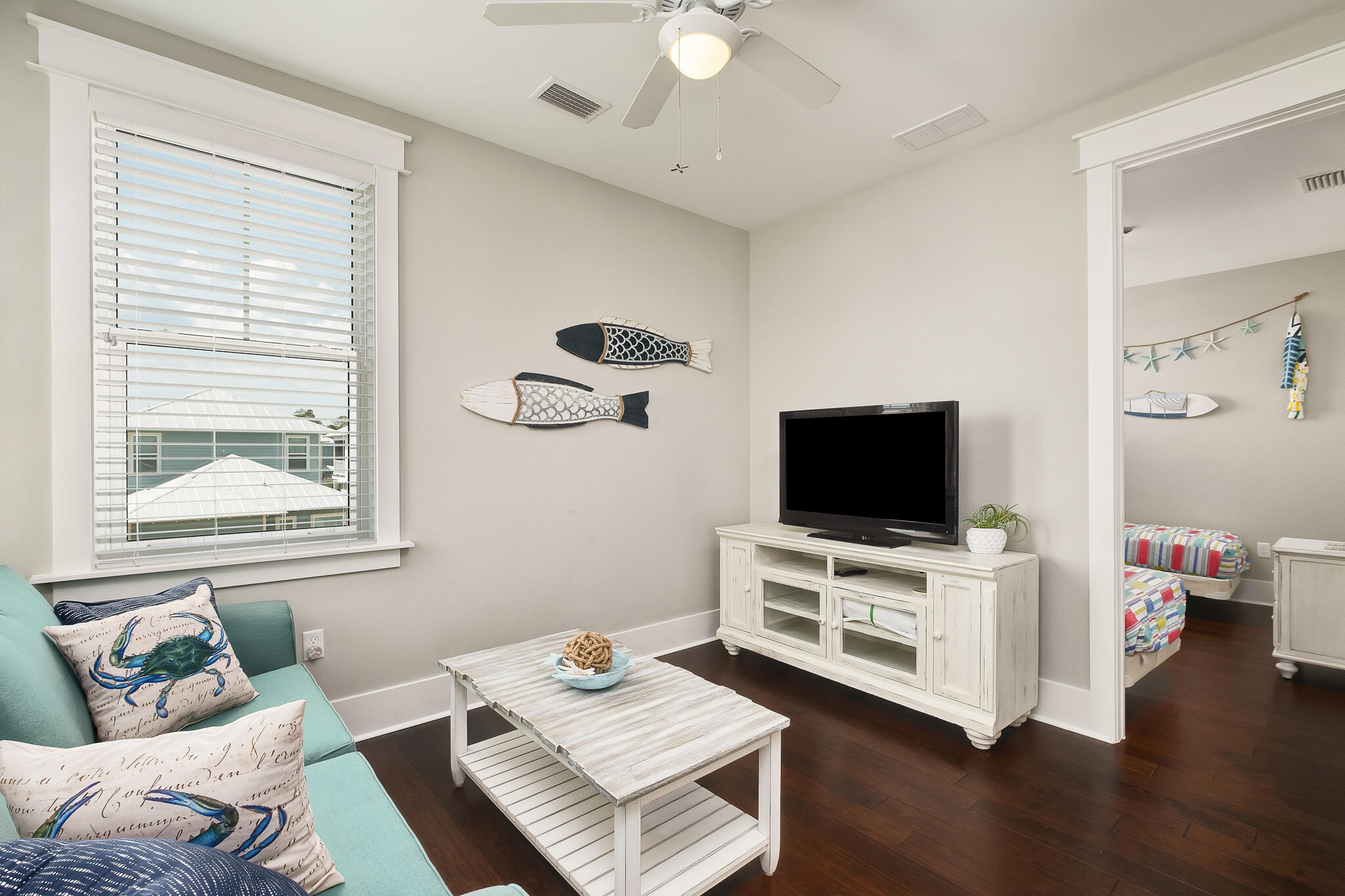 442 Flatwoods Forest Loop Santa Rosa Beach, FL 32459 - Photo 16 of 46 a living room with furniture and a flat screen tv