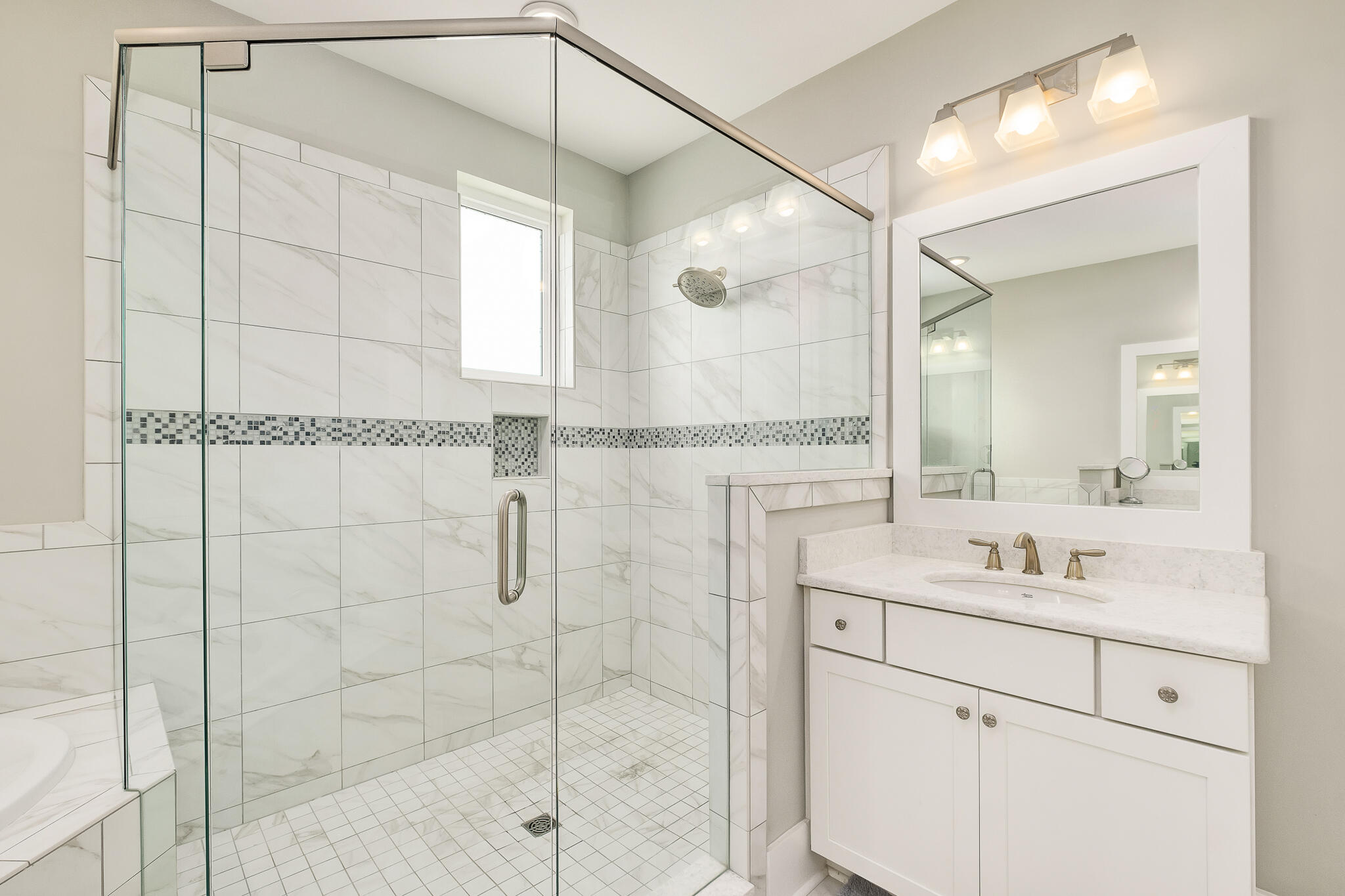 442 Flatwoods Forest Loop Santa Rosa Beach, FL 32459 - Photo 21 of 46 a bathroom with a shower sink and mirror