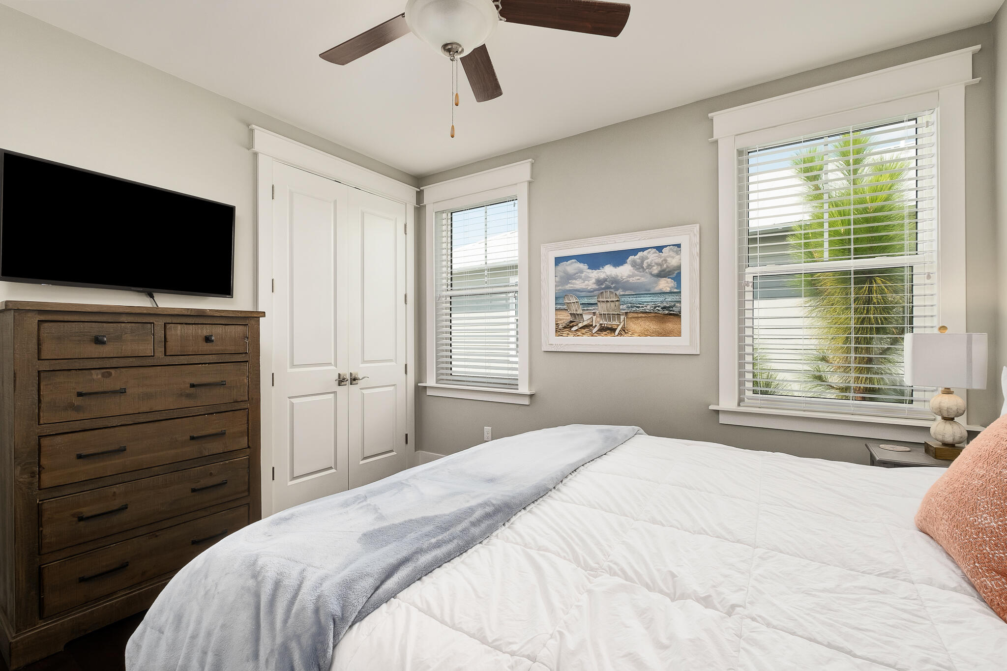 442 Flatwoods Forest Loop Santa Rosa Beach, FL 32459 - Photo 24 of 46 a bedroom with a large bed and a flat screen tv