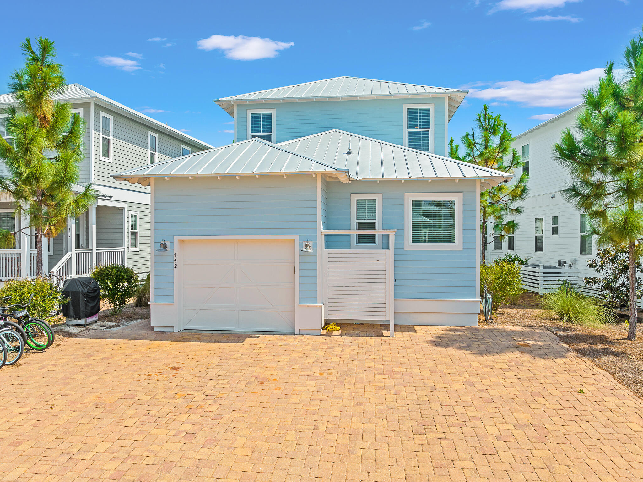 442 Flatwoods Forest Loop Santa Rosa Beach, FL 32459 - Photo 30 of 46 a front view of a house with a yard