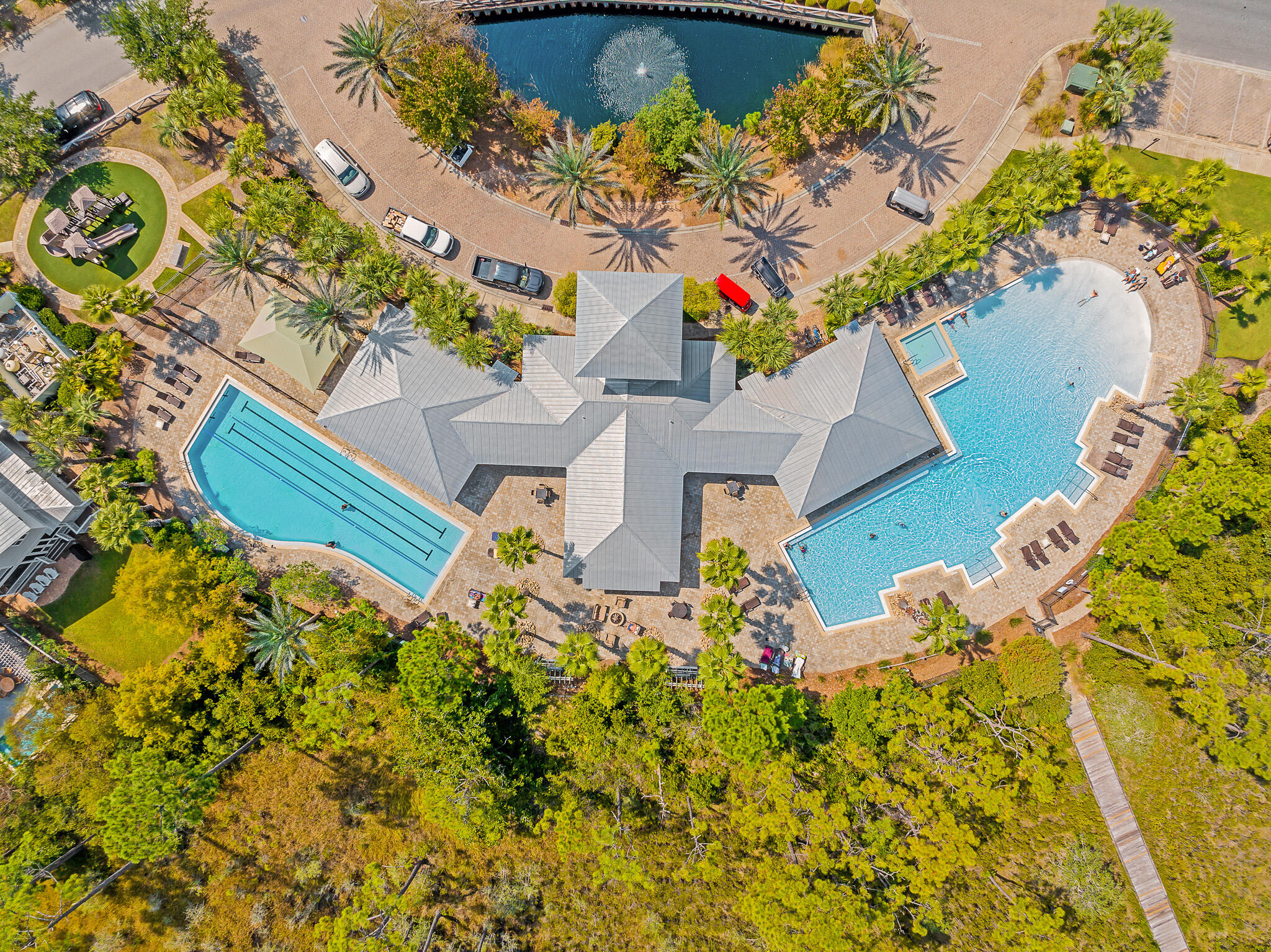 442 Flatwoods Forest Loop Santa Rosa Beach, FL 32459 - Photo 38 of 46 a front view of a house with a yard