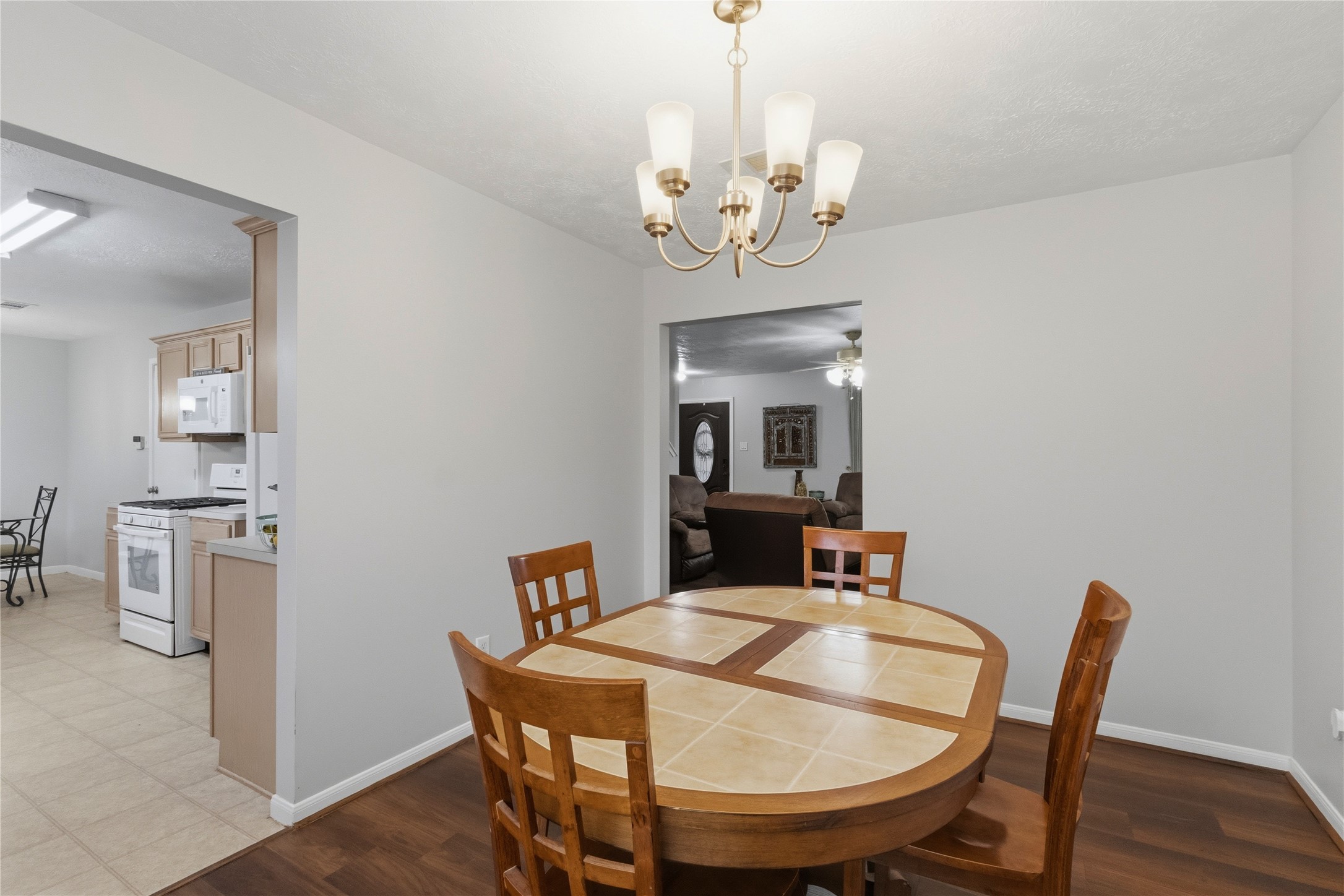 2703 Hidden Spring Vale Drive Spring, TX 77386 - Photo 8 of 29 An opening connects the dining room to the kitchen, enhancing the flow between the two spaces and making it easy to serve meals and socialize.