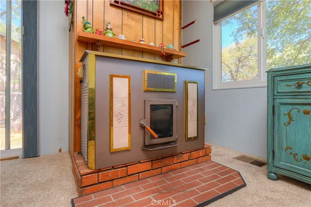 a bedroom with a bed and a mirror