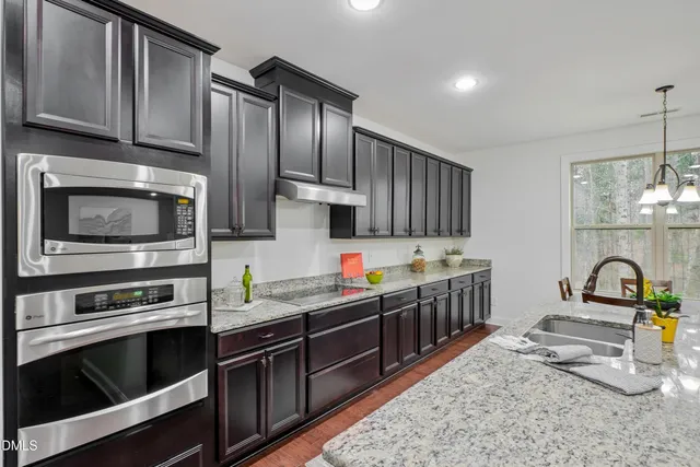a bathroom with a sink and a shower