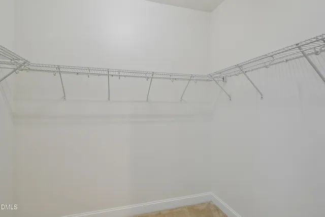 a view of backyard with a garden and deck