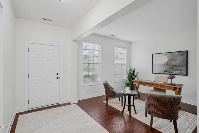 a view of a livingroom with furniture