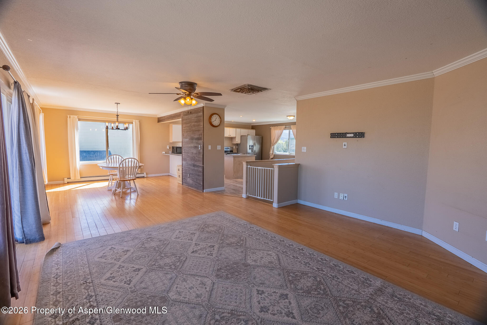 1558 East 12th Street Rifle, CO 81650 - Photo 14 of 25 a view of a livingroom with wooden floor