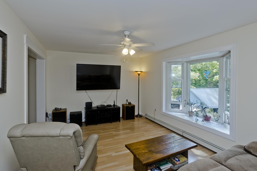 85 Damon Pond Road Chesterfield, MA 01012 - Photo 13 of 42 a living room with furniture and a flat screen tv