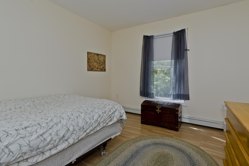85 Damon Pond Road Chesterfield, MA 01012 - Photo 23 of 42 a bedroom with a bed and window
