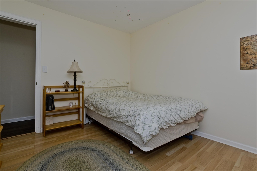 85 Damon Pond Road Chesterfield, MA 01012 - Photo 24 of 42 a bedroom with a bed and a dresser